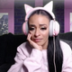 An emotional Thea Trinidad Budgen greets her Twitch subscribers hours after being fired from her WWE role playing the Zelina Vega character.